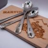Vierteiliges Edelstahl-Kinderbesteck mit dem Namen Elena und vier zauberhaften Motiven