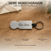 Rückseite des silbernen Einkaufswagenlösers mit Beispielgravur Dein Name und vielen verfügbaren Schriftarten