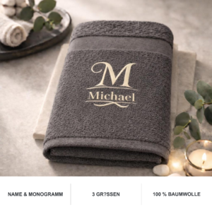 Dunkelgraues Handtuch mit Monogramm M und gesticktem Namen Michael sowie Produktvorteilen